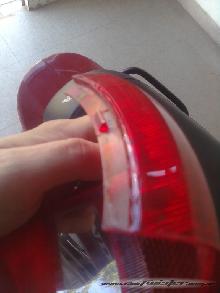 Cambiar Foco luz trasera Honda Biz